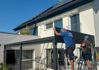 Zitberg-MA-arbeiten-an-einer-Überdachung